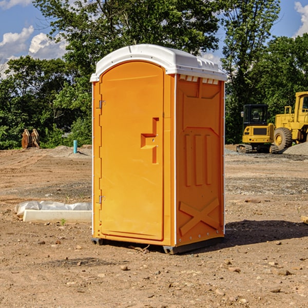 how often are the portable restrooms cleaned and serviced during a rental period in Hawks MI